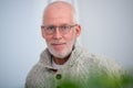 Portrait of middle-aged man with beard and glasses Royalty Free Stock Photo