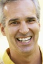 Portrait Of Middle Aged Man Smiling At The Camera Royalty Free Stock Photo