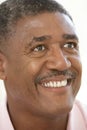 Portrait Of Middle Aged Man Smiling Happily Royalty Free Stock Photo