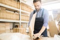 Portrait of Middle-Aged Warehouse Worker