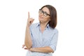 Portrait of middle-aged woman in glasses with index finger up, attention, white background isolated Royalty Free Stock Photo