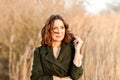 Portrait of middle aged woman posing at the park Royalty Free Stock Photo