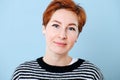 Portrait of a middle aged woman with short ginger hair Royalty Free Stock Photo