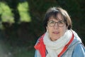 Portrait of middle-aged woman in the spring sun Royalty Free Stock Photo