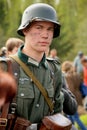 Portrait of a military re - enactor in German uniform world war II. German soldier. Royalty Free Stock Photo