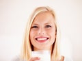 Portrait, milk mustache and a woman drinking from a glass in studio isolated on a white background. Happy, nutrition and Royalty Free Stock Photo