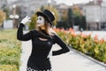 Portrait of a mime comedian. mime girl on the street