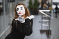 The girl with makeup of the mime. improvisation