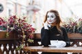 Portrait of a mime comedian. mime girl on the street Royalty Free Stock Photo