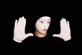 Portrait of mime in gloves