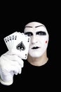 Portrait of the mime with Royal Flush Royalty Free Stock Photo