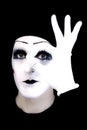 Portrait of the mime in white gloves. Ok. Royalty Free Stock Photo