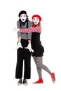 Portrait of mimes. happy woman embracing man