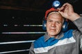 Portrait miner coal man in helmet with lantern in underground mine. Concept industrial engineer Royalty Free Stock Photo