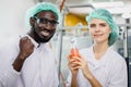 Portrait of mix race worker in food and drink factory happy worker together looking camera and smile