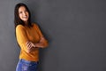 Portrait, mockup and face of happy woman in fashion with smile, clothes and sweater on gray background. Female