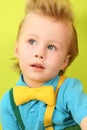 Portrait of mod little boy in blue checkered