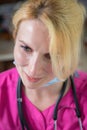 Portrait of a modern doctor girl. Young girl doctor in her office.