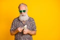 Portrait of modern funky funny old bearded man in stylish eyewear eyeglasses true worker on resort count money credit Royalty Free Stock Photo