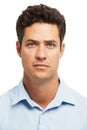 Portrait of a modern man. Head and shoulders portrait of a handsome young man looking at you seriously. Royalty Free Stock Photo