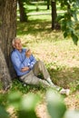 Senior Man Relaxing in Park Royalty Free Stock Photo