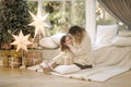 Portrait of mom and daughter in Christmas time. Happy family spent time together during the holiday Royalty Free Stock Photo