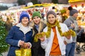 Portrait of mom with daughter and son at christmas street fair Royalty Free Stock Photo