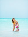 Portrait of mother and baby girl at seaside Royalty Free Stock Photo