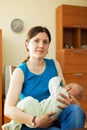 Portrait of mother breast feeding baby Royalty Free Stock Photo