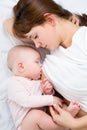 Portrait of mother breast feeding her baby Royalty Free Stock Photo