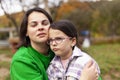 Portrait of a mother and daughter on an autumn day in the park Royalty Free Stock Photo