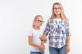 Portrait of mother and daughter with eyeglasses on white background Royalty Free Stock Photo