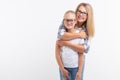 Portrait of mother and daughter with eyeglasses on white background Royalty Free Stock Photo