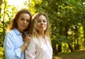 portrait of mother and daughter hugging, summer time, park Royalty Free Stock Photo