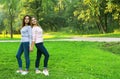 portrait of mother and daughter hugging, summer time, park Royalty Free Stock Photo