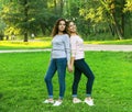 portrait of mother and daughter hugging, summer time, park Royalty Free Stock Photo