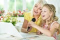 Mother and daughter singing karaoke