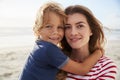 Portrait Of Mother Hugging Son On Summer Beach Vacation Royalty Free Stock Photo