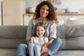 Smiling two female generations posing for family photo. Royalty Free Stock Photo