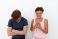 Portrait of mother and son together against white background Royalty Free Stock Photo