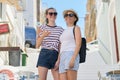 Portrait of mother and teenage daughter talking smiling Royalty Free Stock Photo