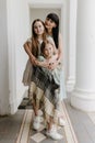 Portrait of a mother and two daughters. Happy family spend time together Royalty Free Stock Photo