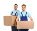Portrait of moving service employees with cardboard boxes