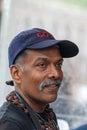 Portrait of Mr Thiru Kumar, the operator of food cart serving South Indian dosas in Washington Square Park in Manhattan, New York