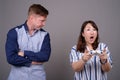 Portrait of multi ethnic diverse couple playing video games Royalty Free Stock Photo