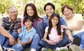 Portrait multi-generation Asian family in park Royalty Free Stock Photo