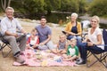 Portrait Of Multi Generation Family Enjoying Picnic In Countryside Royalty Free Stock Photo