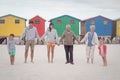 Portrait of multi-generation family holding hands at beach Royalty Free Stock Photo