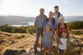 Portrait Of Multi Generation Family Standing At Top Of Hill On Hike Through Countryside In Lake District UK Royalty Free Stock Photo