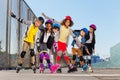 Happy sporty inline skaters having fun outdoors Royalty Free Stock Photo